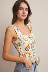 IVORY TROPICAL PRINT LINED PEPLUM TOP