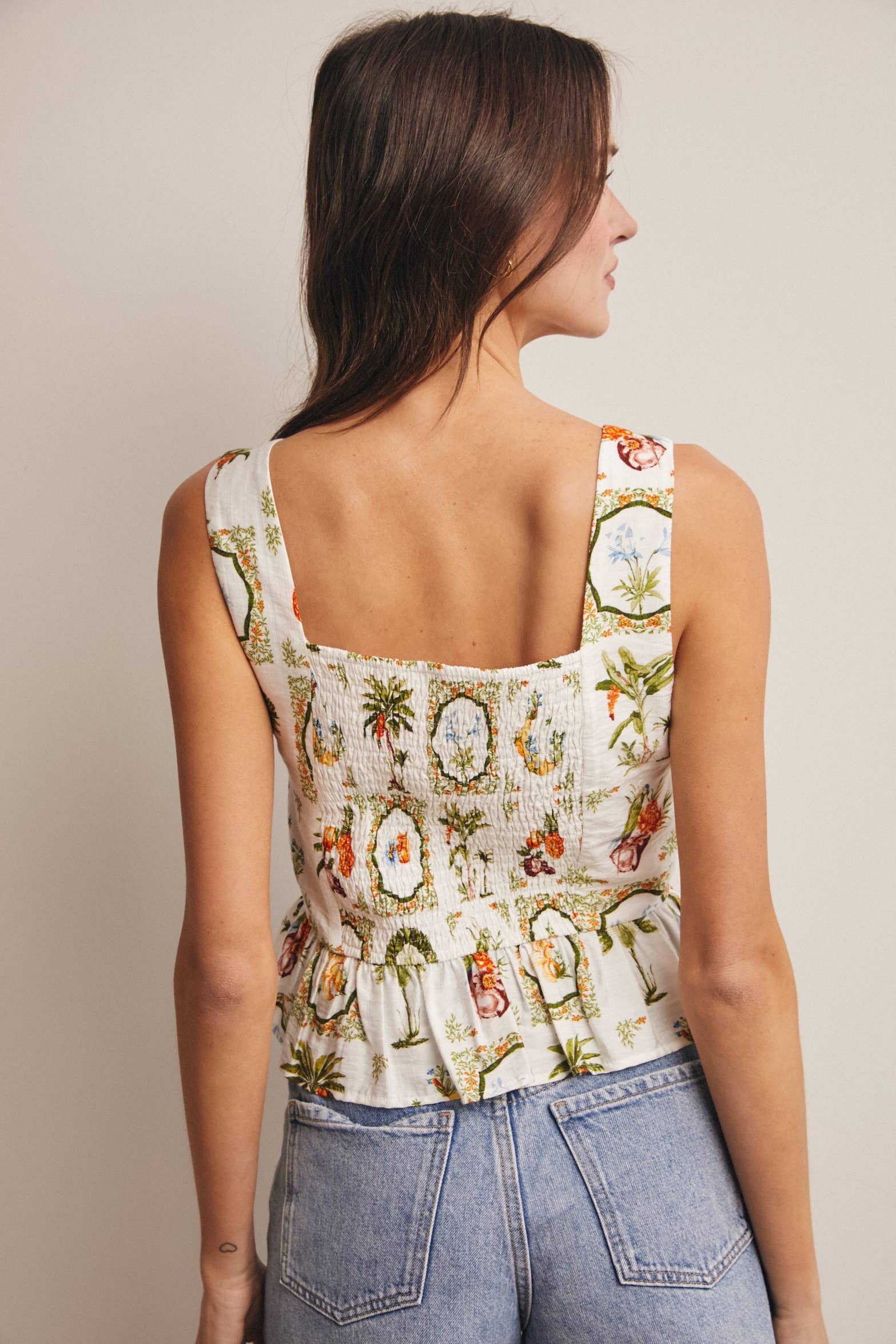 IVORY TROPICAL PRINT LINED PEPLUM TOP