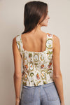 IVORY TROPICAL PRINT LINED PEPLUM TOP
