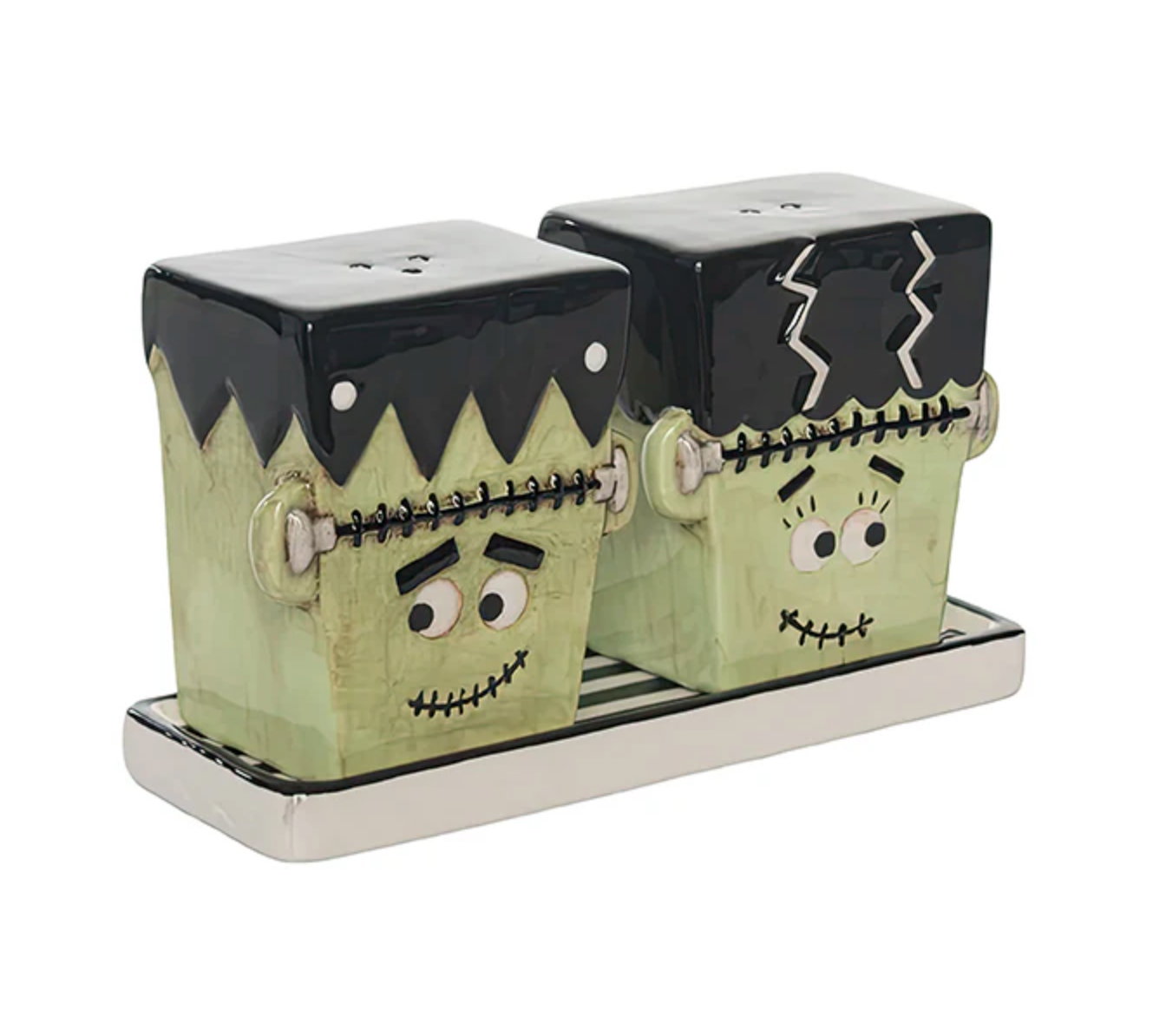 Frankenstein-themed salt and pepper shakers on a white background