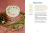 Cocktail glass with a Thyme Gimlet on a pink background with thyme sprigs.