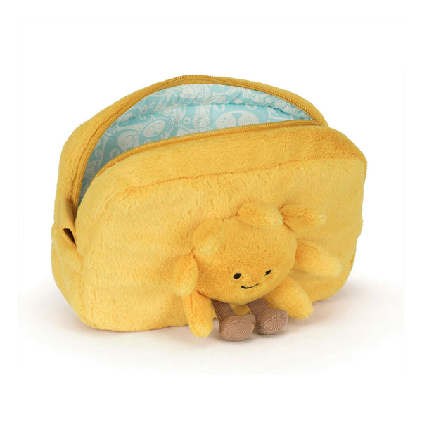 Yellow plush bee toy with a smiling face inside a matching yellow pouch on a white background