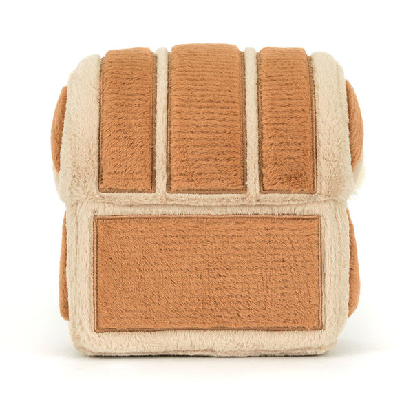 Textured cube-shaped toy with brown and beige pattern on a white background