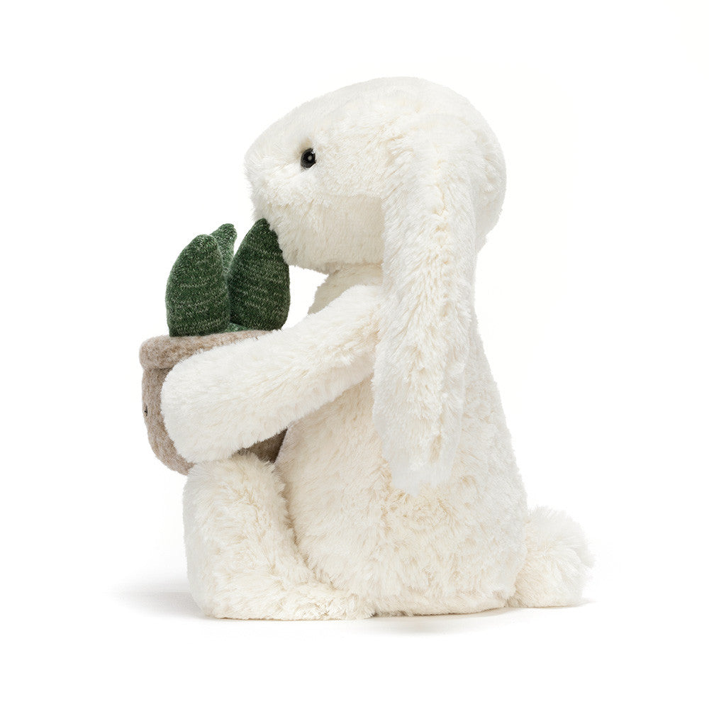 CREAM BUNNY WITH PLANT