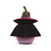 Plush toy shaped like an eggplant with a black cape on a white background