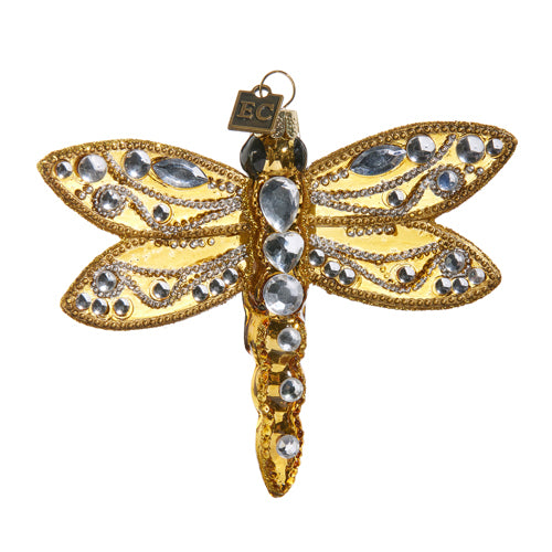 A gold-colored jewelled dragonfly ornament with a resin hook at the top, adorned with glass beads and crystal embellishments.