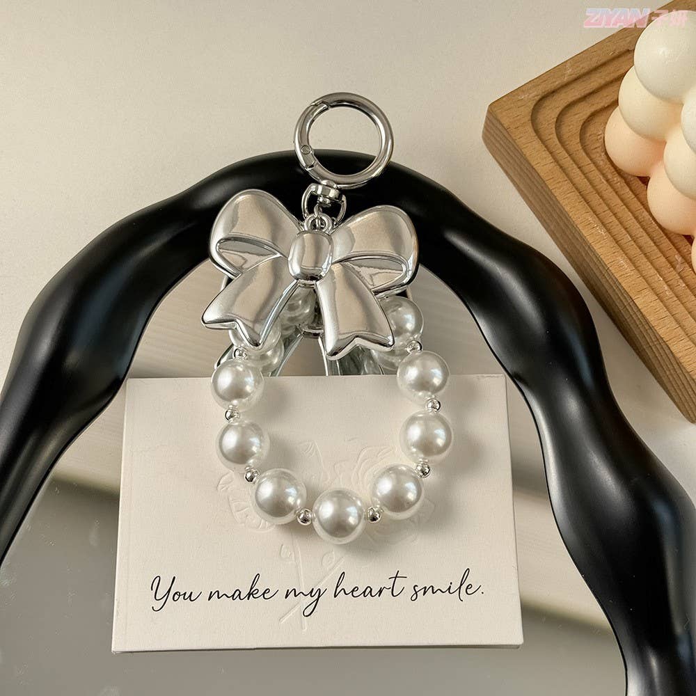 CHUNKY PEARL BOW BAG CHARM