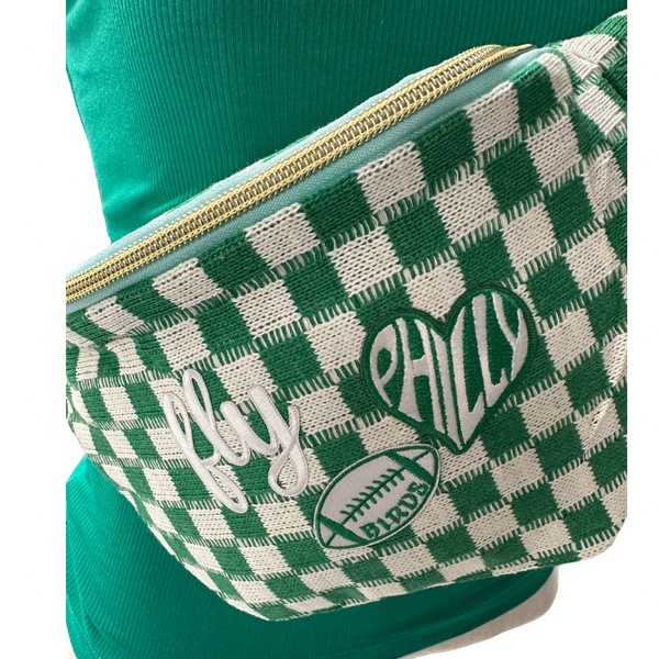 Green and white checkered fanny pack with 'Philly' and football design on a green background