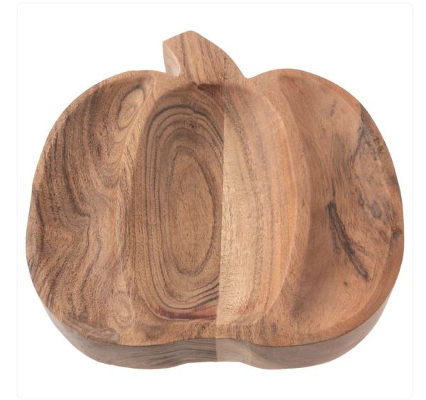 Wooden pumpkin-shaped cutting board on a white background