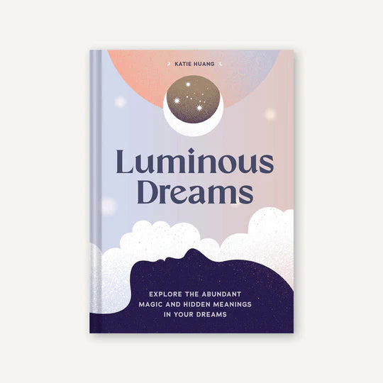 Book titled 'Luminous Dreams' by Katie Huang with a celestial design on the cover.