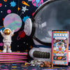 Space-themed display with astronaut figure, planet model, and MAEVZ Moon Rocks packaging.