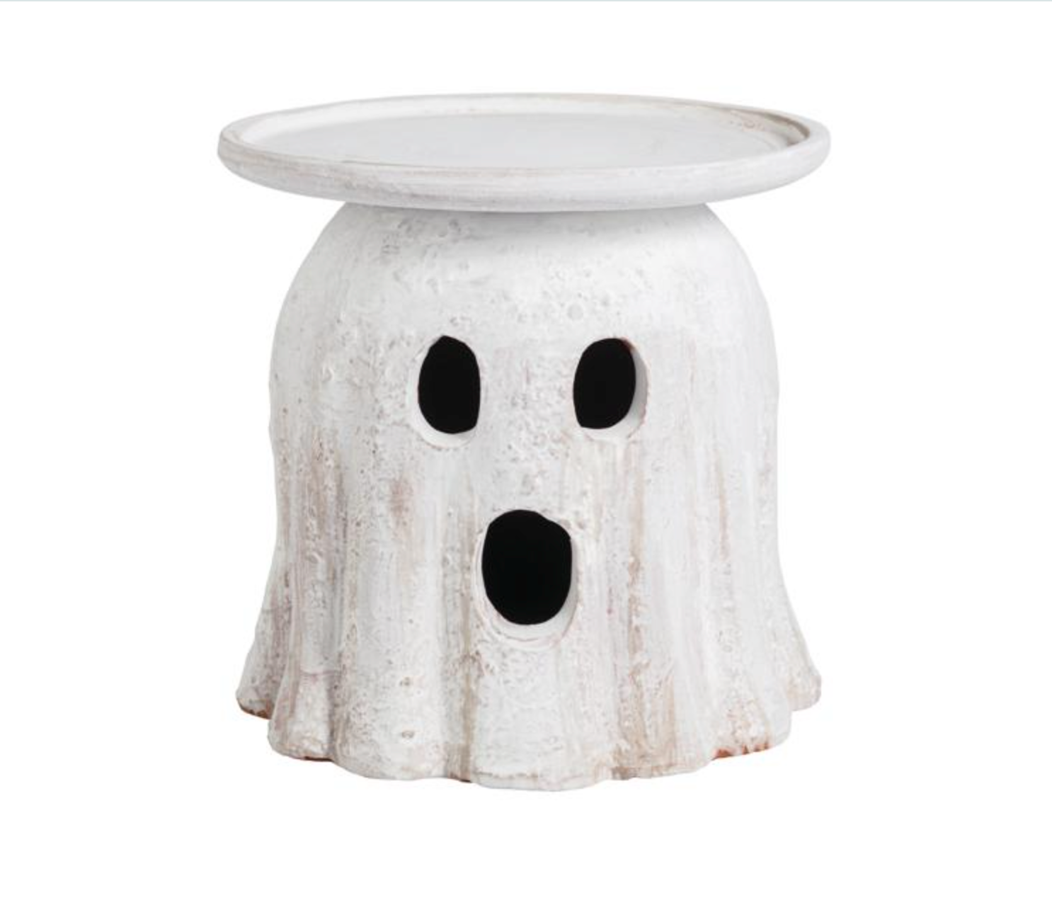 White ghost-shaped stool with black eye and mouth holes on a white background