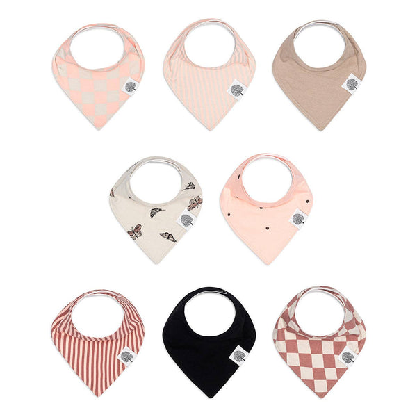 Set of nine baby bibs with various patterns on a white background