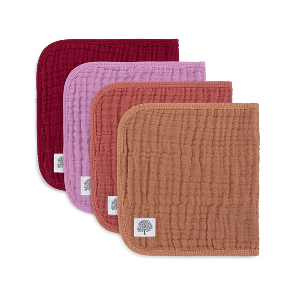Four textured fabric pads in red, pink, and brown on a white background