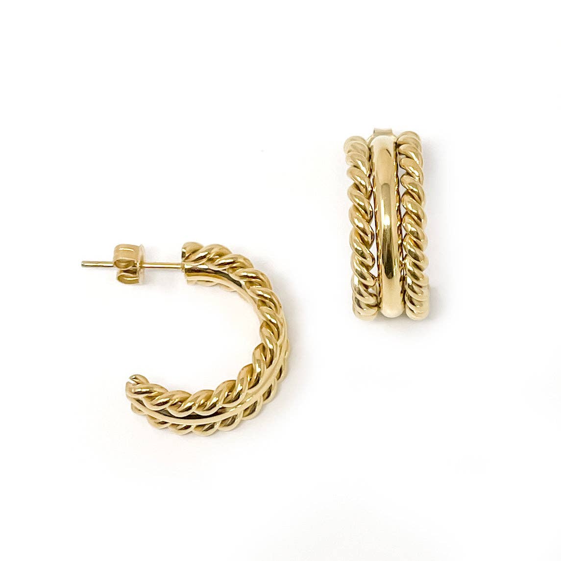 Gold hoop earrings on a white background