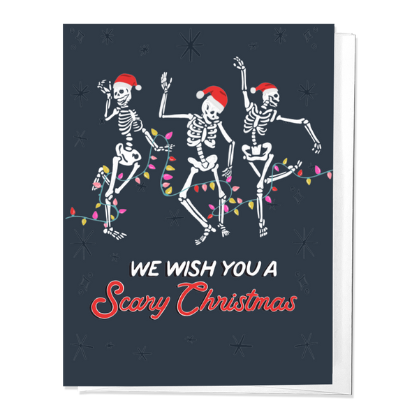 Greeting card with dancing skeletons wearing Santa hats and the text 'WE WISH YOU A Scary Christmas'