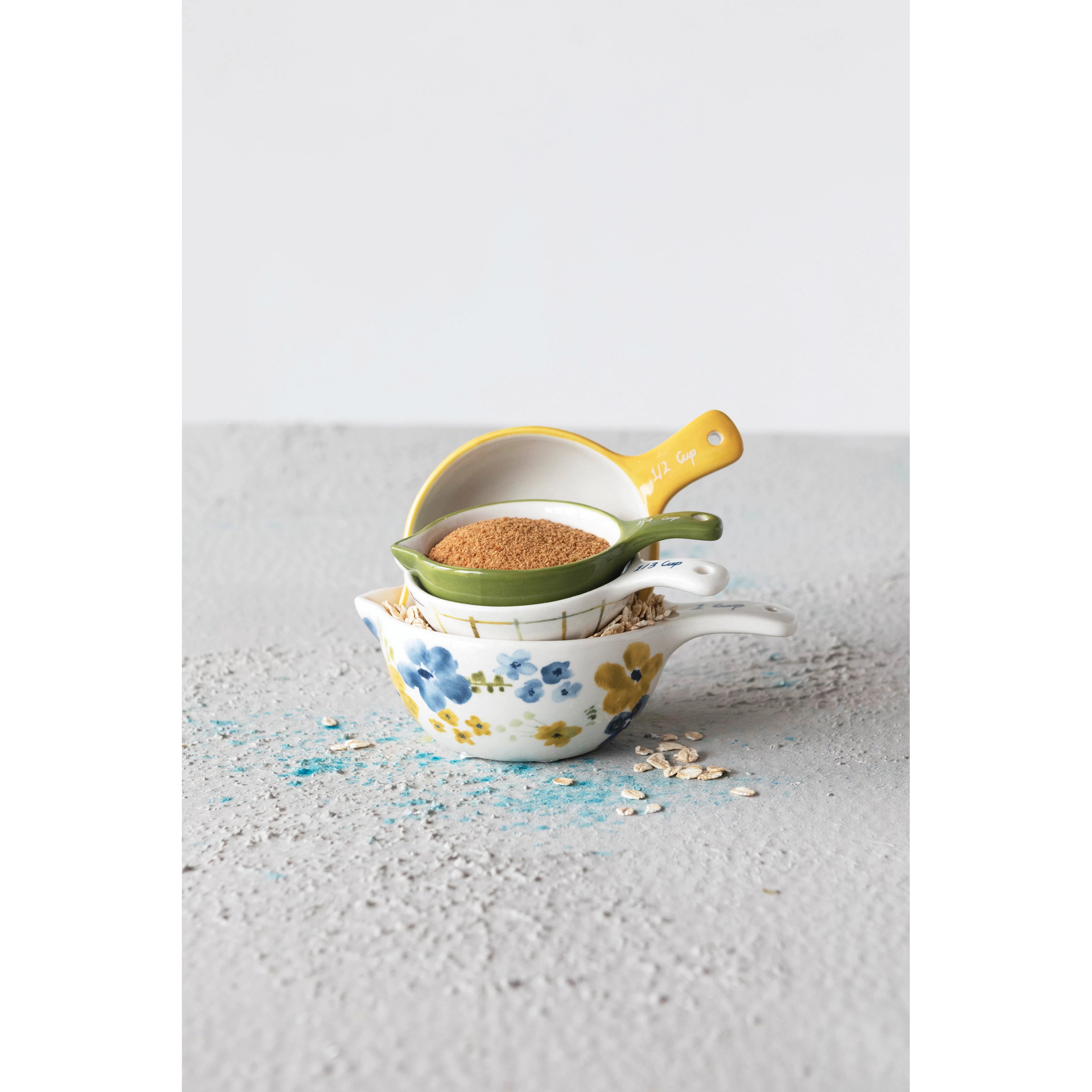 HAND-PAINTED STONEWARE MEASURING CUPS