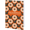 Greeting card with floral pattern and humorous text on an orange background