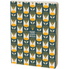 Notebook with yellow floral pattern and 'Half-Assed Ideas' text on a white background