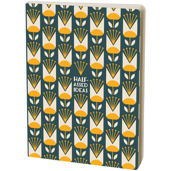 Notebook with yellow floral pattern and 'Half-Assed Ideas' text on a white background