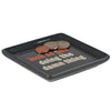 Black tray with coins and humorous text on a white background