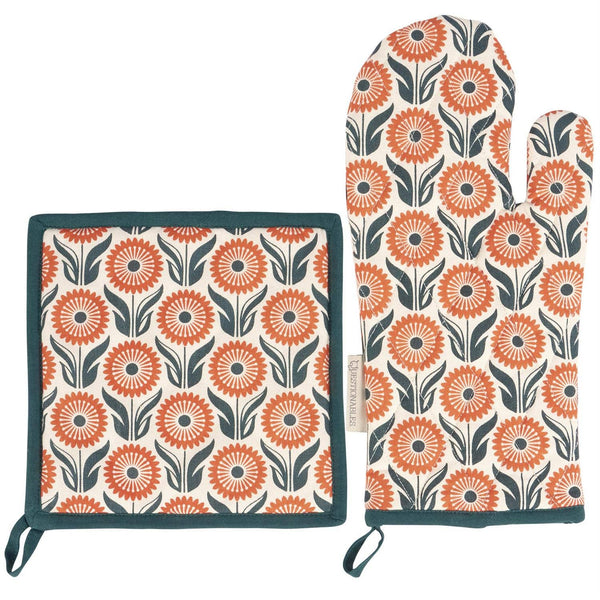 Floral patterned pot holder and oven mitt on a white background