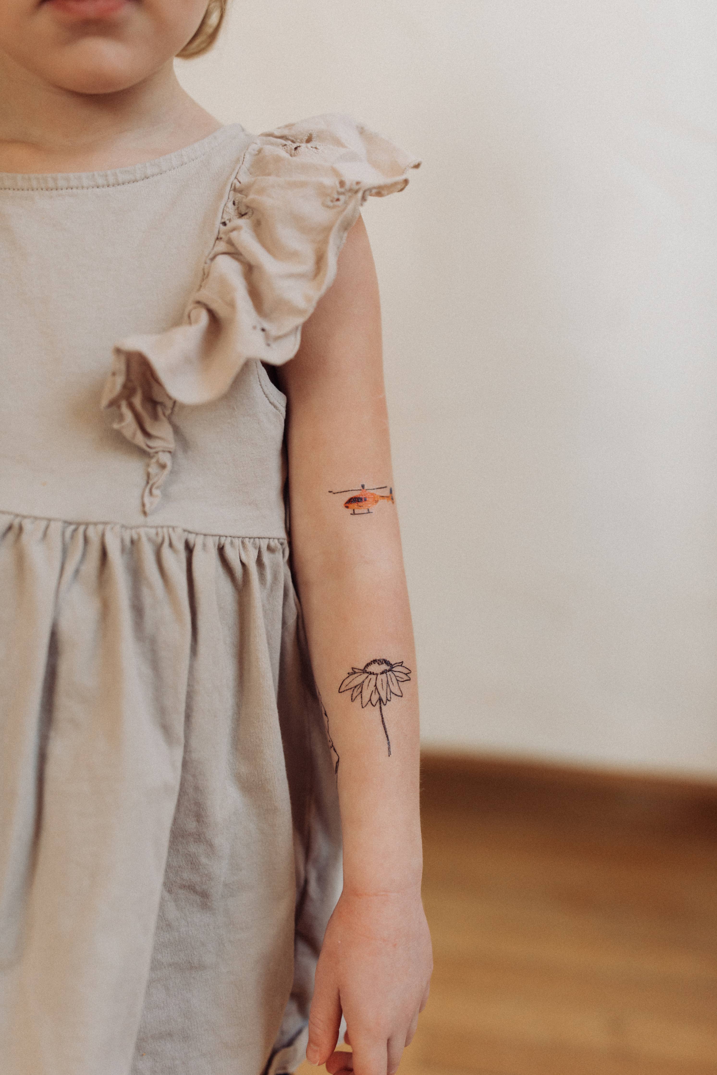Temporary tattoo on a child's arm