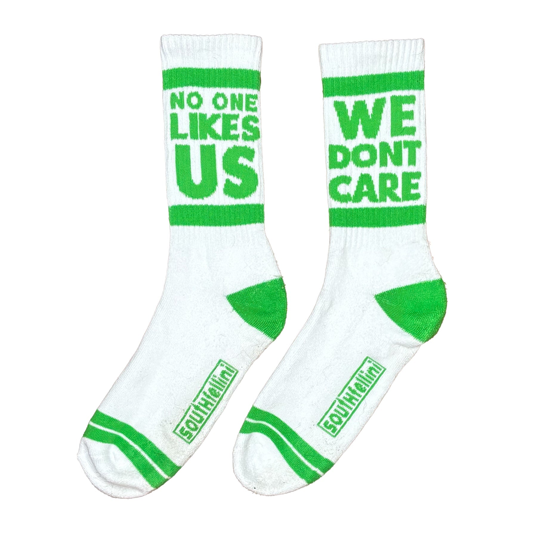 NO ONE LIKES US, WE DON'T CARE SOCKS (WHITE)