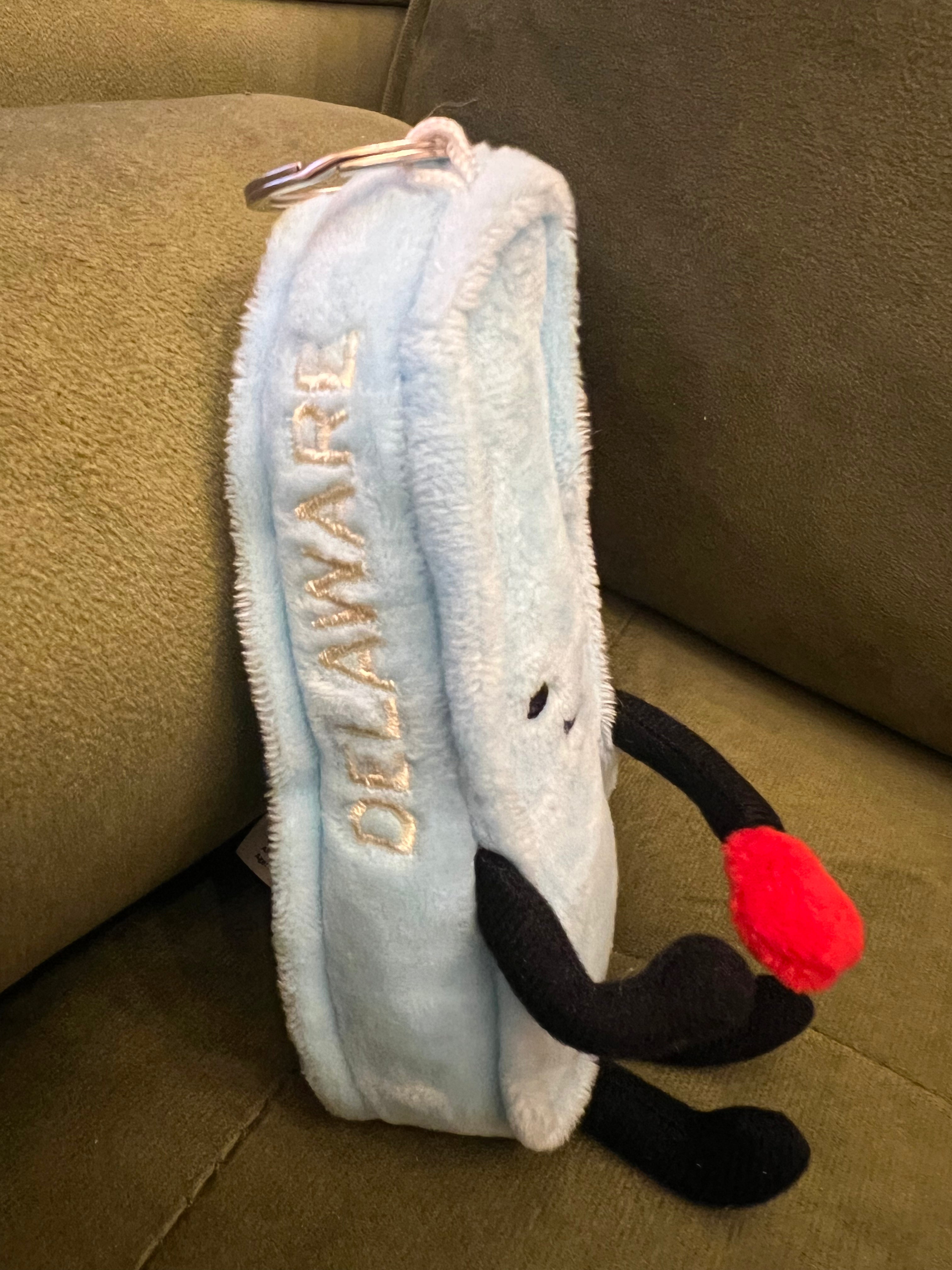 DELAWARE PLUSH BAG CHARM