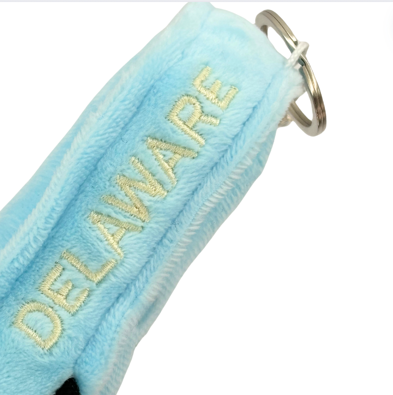 DELAWARE PLUSH BAG CHARM