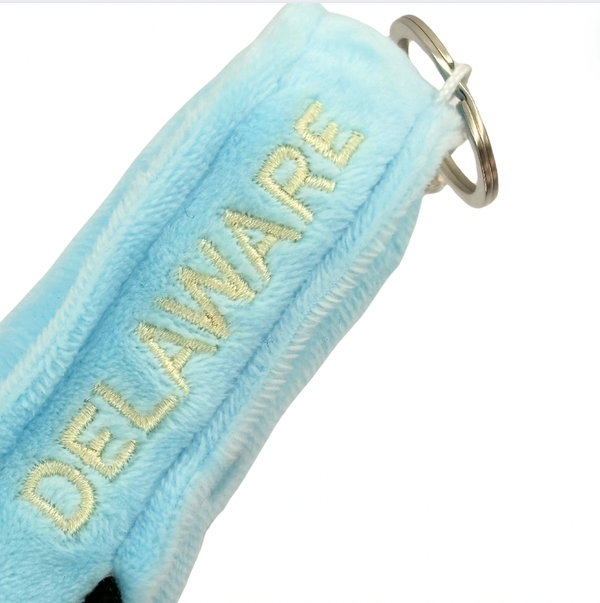 DELAWARE PLUSH BAG CHARM