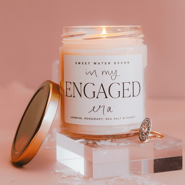 IN MY ENGAGED ERA SOY CANDLE - CLEAR JAR -  9 OZ (WILDFLOWERS AND SALT)