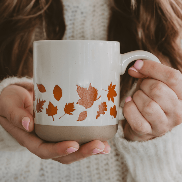 ORANGE LEAVES 14OZ. CREAM STONEWARE COFFEE MUG