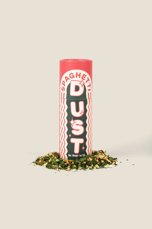 Spaghetti Dust container with a pink top on a beige background