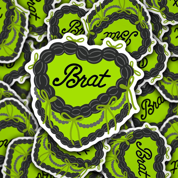 Stack of green and black 'Brat' themed stickers with braided design.