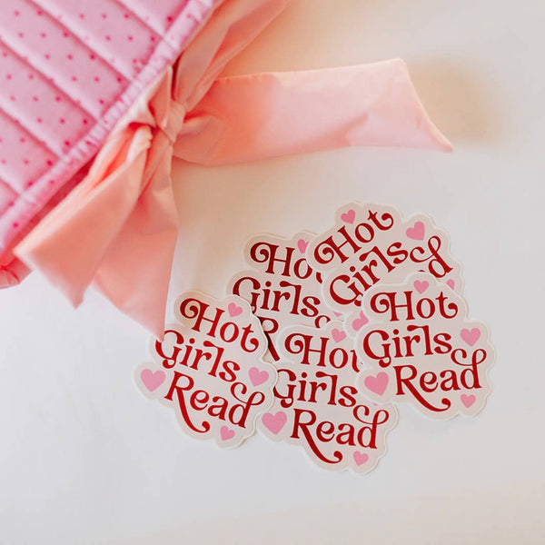 White shirt with red text and pink hearts on a white background