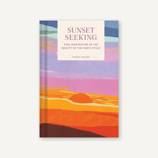 Book titled 'Sunset Seeking' with a colorful sunset design on the cover.