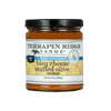 A jar of Terrapin Ridge Farms Blue Cheese Stuffed Olive Tapenade, with a label showing the product name and a brief description.