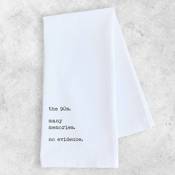 White napkin with black text on a light gray background