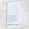 White towel with black text on a light gray background