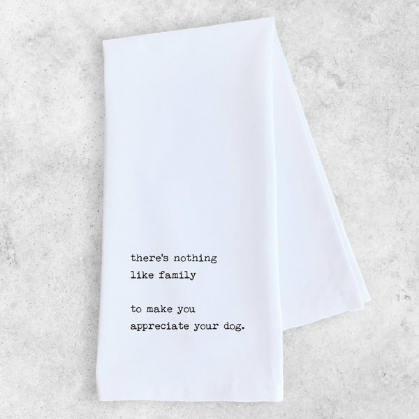 White towel with black text on a light gray background