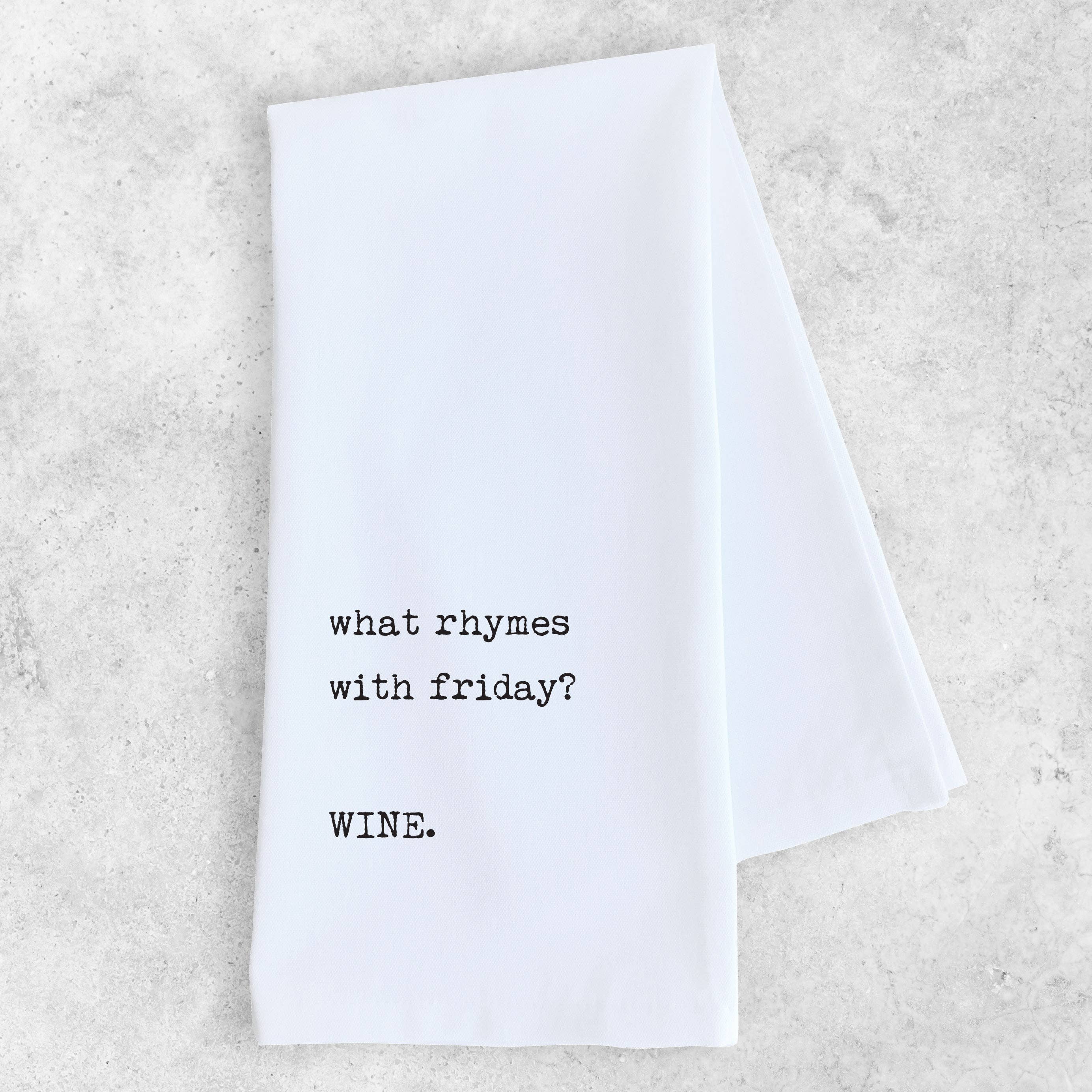 White napkin with black text on a light gray background