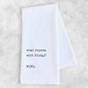 White napkin with black text on a light gray background