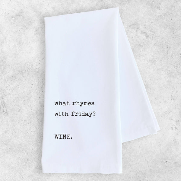 White napkin with black text on a light gray background