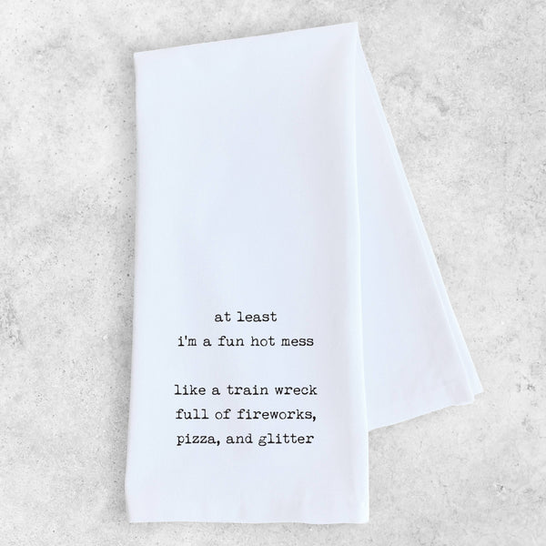 White towel with black text on a light gray background