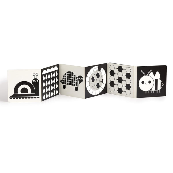 Children's board book with black and white illustrations on a white background