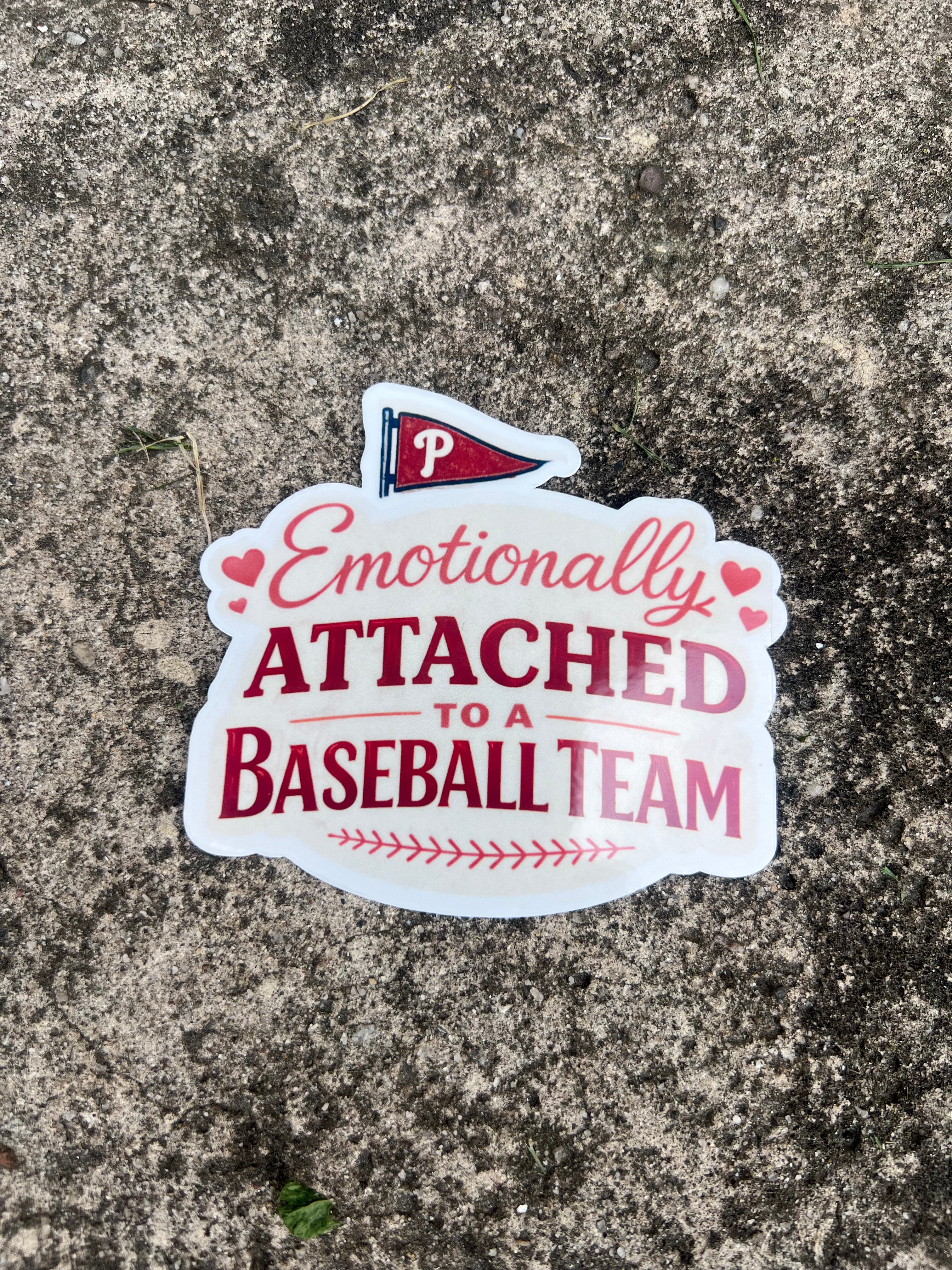 EMOTIONALLY ATTACHED TO A BASEBALL TEAM STICKER