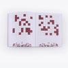 Open book with crossword puzzle pages on a white background