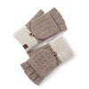A pair of knit fingerless gloves in taupe and cream, featuring a snap-button closure and a small brown leather brand patch.