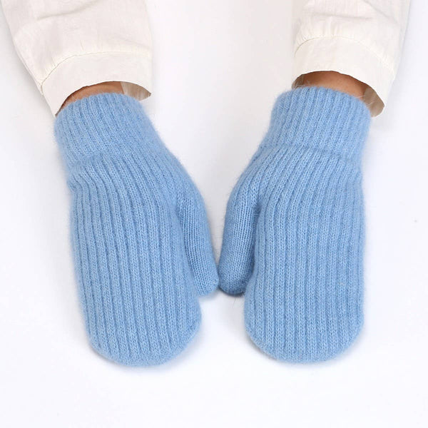 A pair of light blue ribbed knit mitten gloves worn on hands with white cuffs visible, photographed against a clean white background.